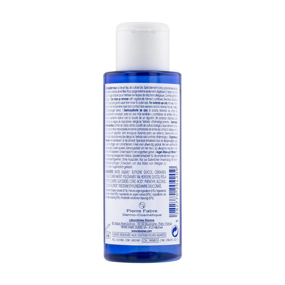 Retro di un flacone blu. Testo: ingredienti, produttore Pierre Fabre. Per occhi sensibili.