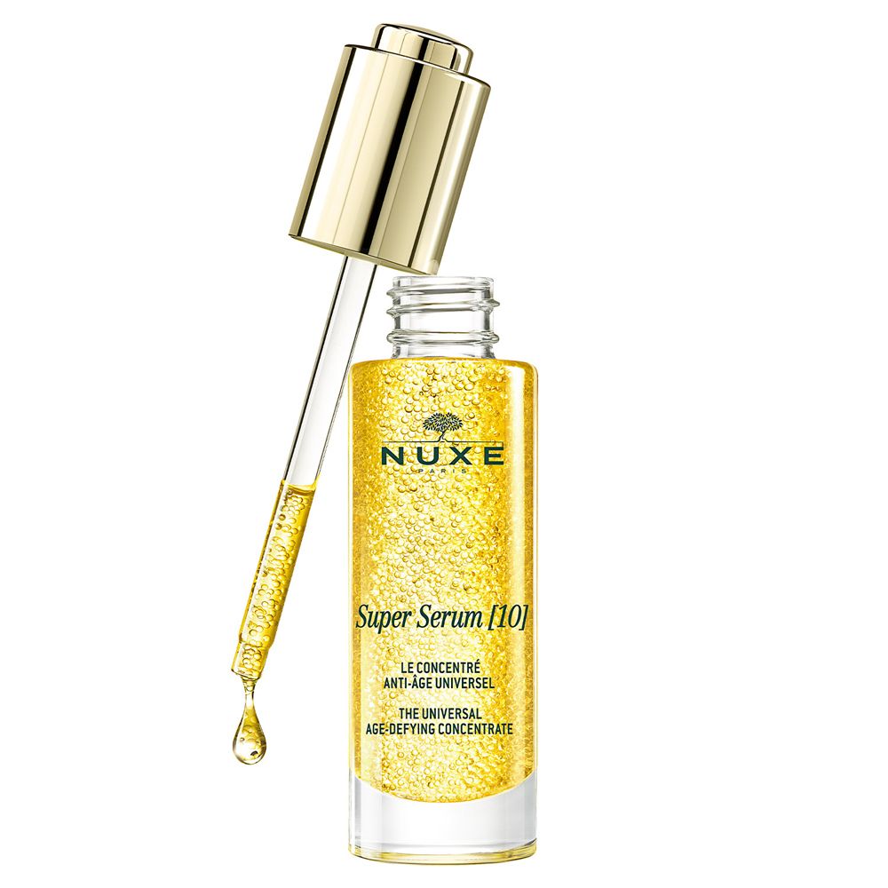 Siero dorato in bottiglia con pipetta. Scritta: NUXE Super Serum [10].