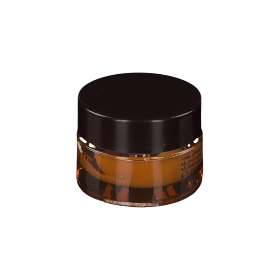 Vasetto rotondo con coperchio marrone. Balsamo color miele.