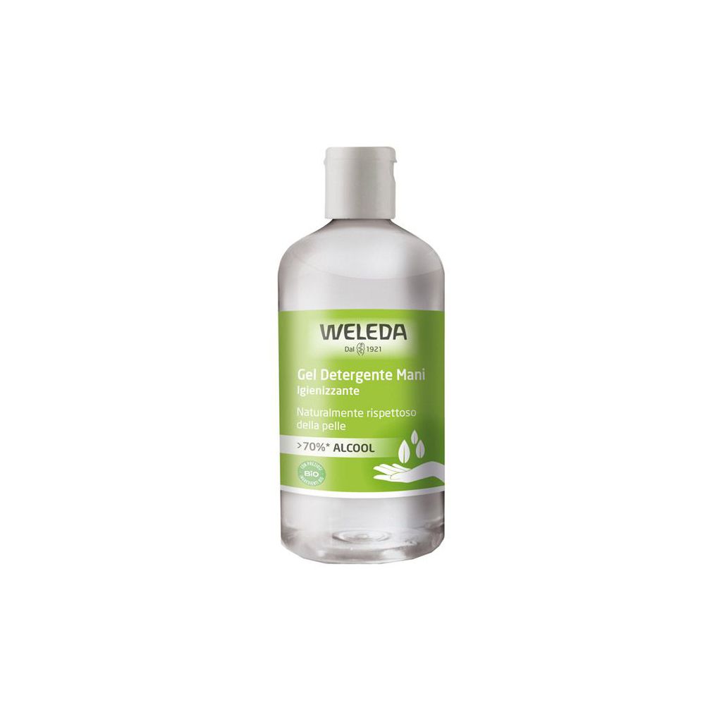 Flacone trasparente di gel Weleda. Tappo bianco. Etichetta verde con testo e logo. Contiene più del 70% di alcol.