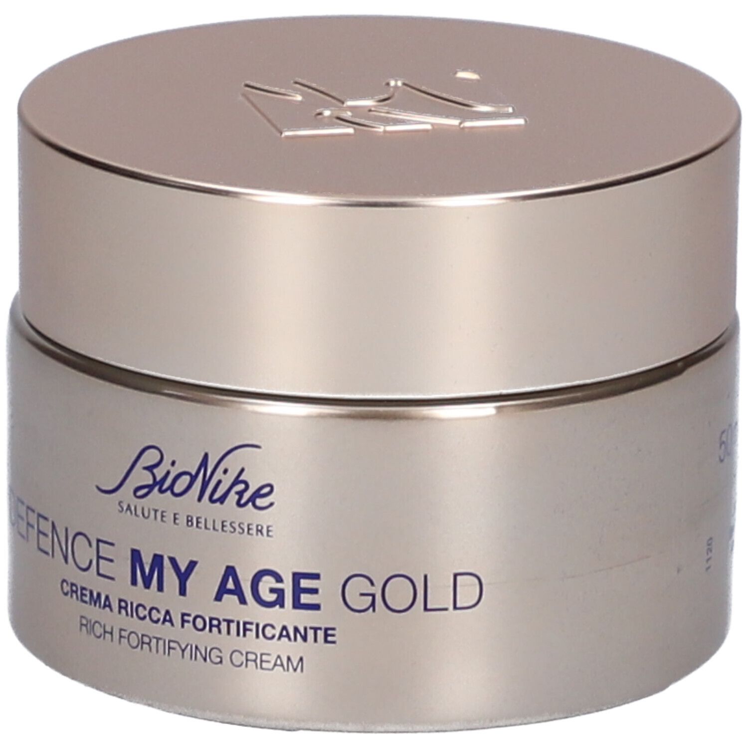 Beige Creme-Tiegel mit Deckel. Aufschrift: BioNike, DEFENCE MY AGE GOLD, Rich Fortifying Cream. Blauer Schriftzug.