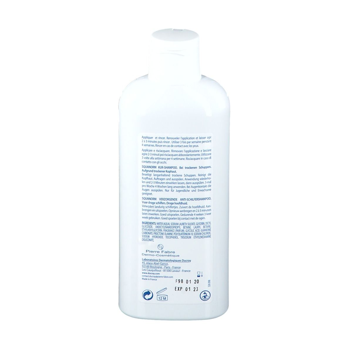 Dos du flacon de shampooing. Texte : instructions d'utilisation, ingrédients, informations fabricant. Logos.