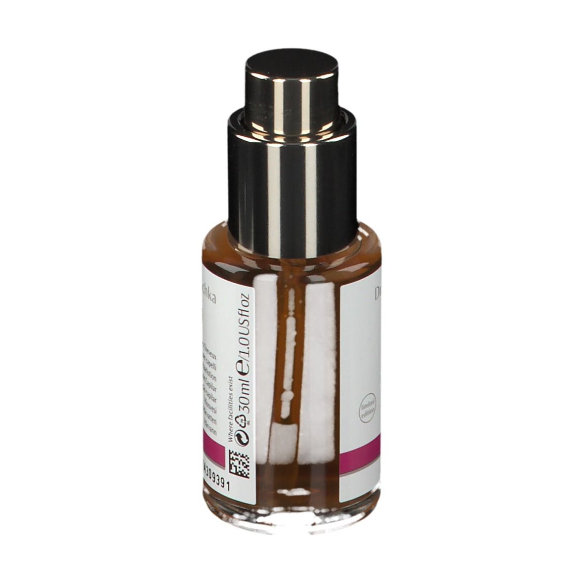 Flacone di vetro marrone con vaporizzatore. Etichetta con 'Haartonikum' e 'Hair Tonic'.