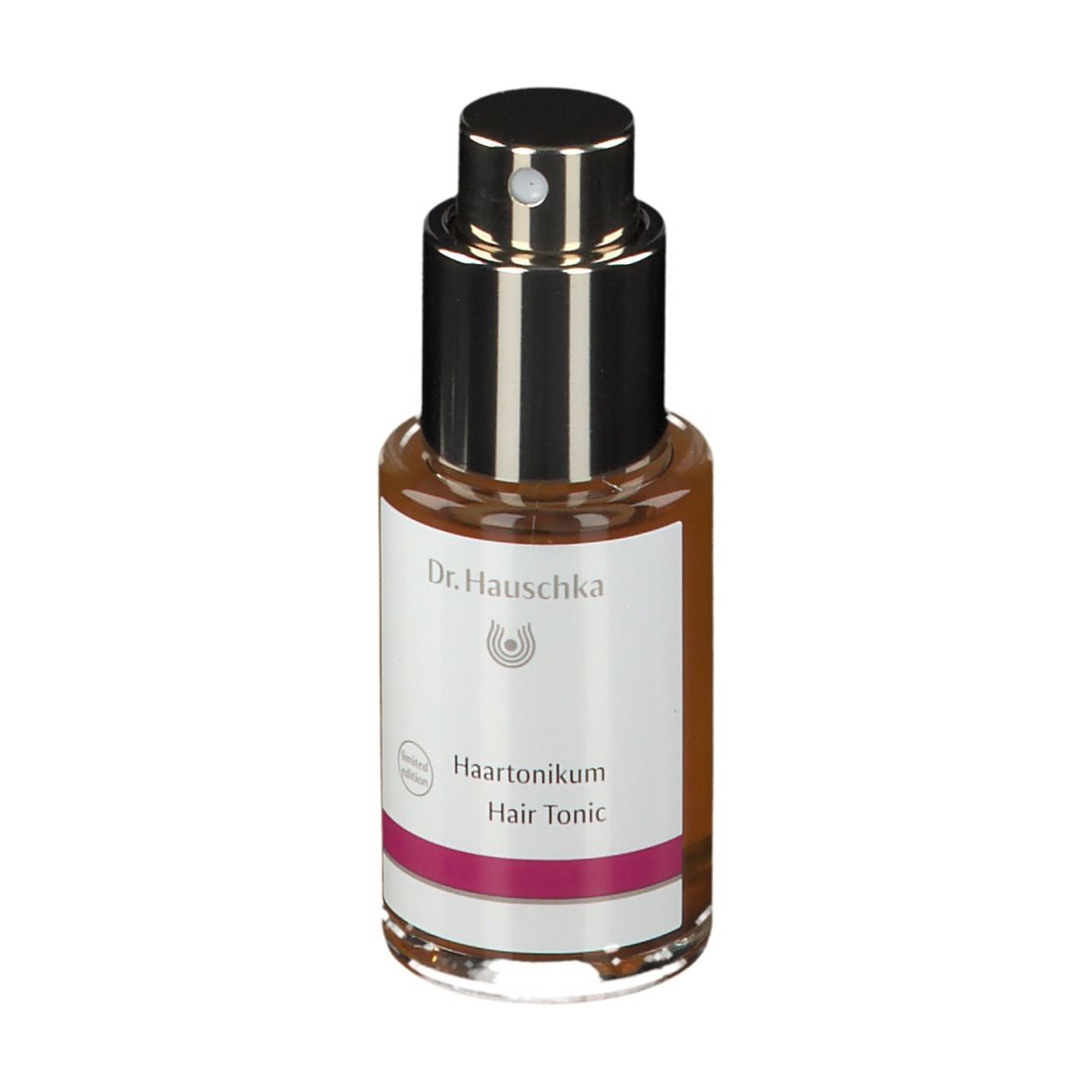 Flacone di vetro marrone con vaporizzatore. Etichetta con 'Haartonikum' e 'Hair Tonic'.