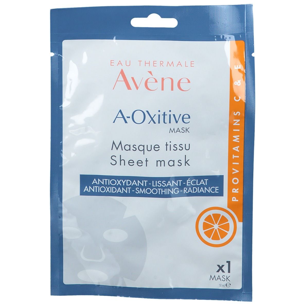 Verpackung der Avène A-Oxitive Tuchmaske. Vorderseite mit Produktnamen, Schriftzug und Orangen-Illustration. Einzelpackung.