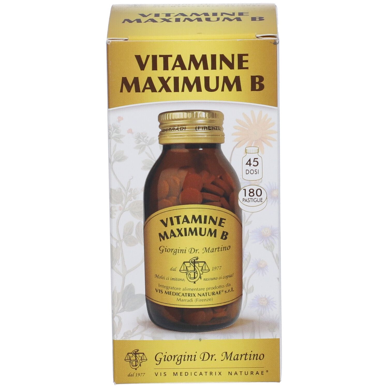 Vitamine Maximum B in scatola. Flacone in vetro marrone con compresse. Scritta: Vitamine Maximum B, 180 Pastiglie.
