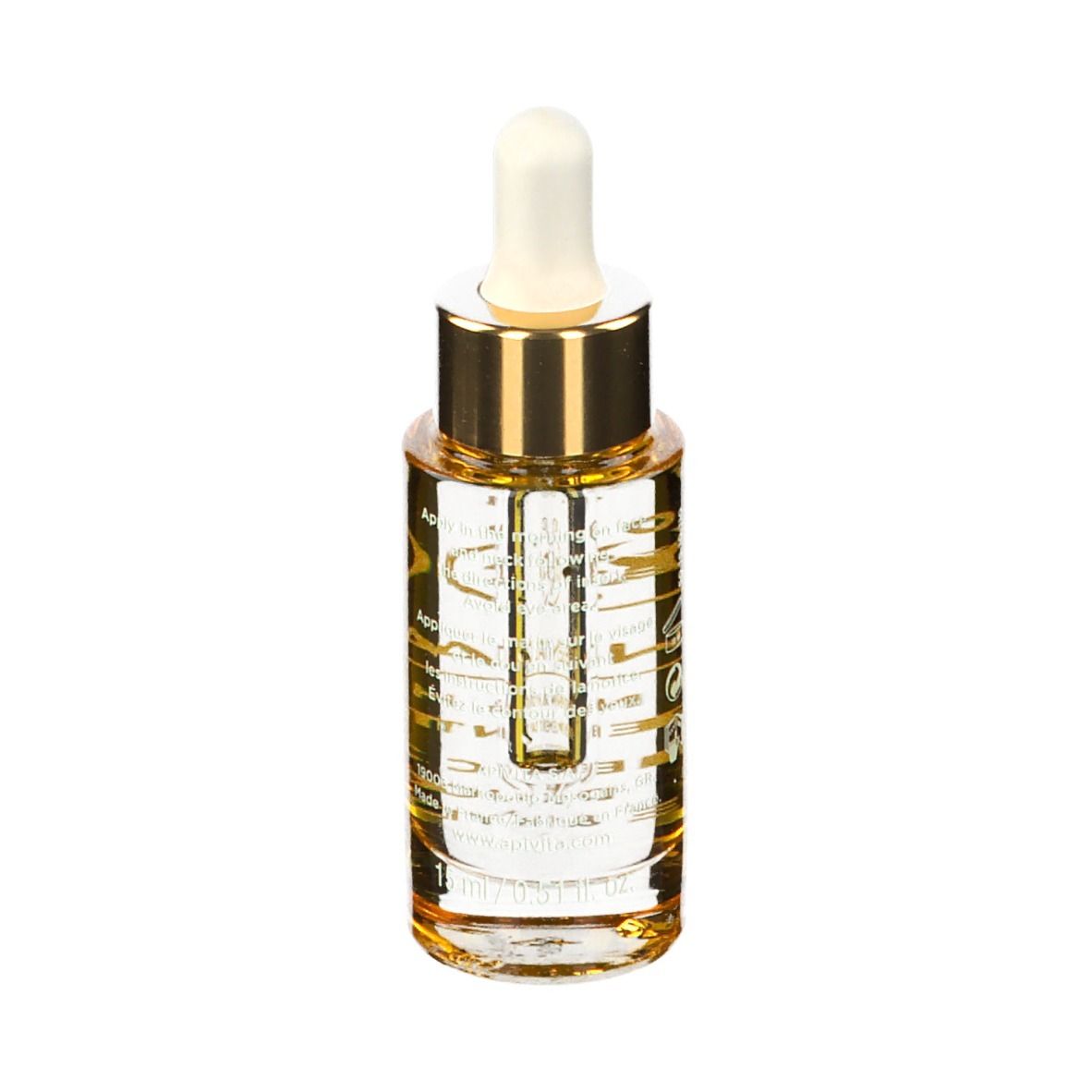Flacone di olio con contagocce. Tappo dorato, punta bianca. Etichetta con testo.