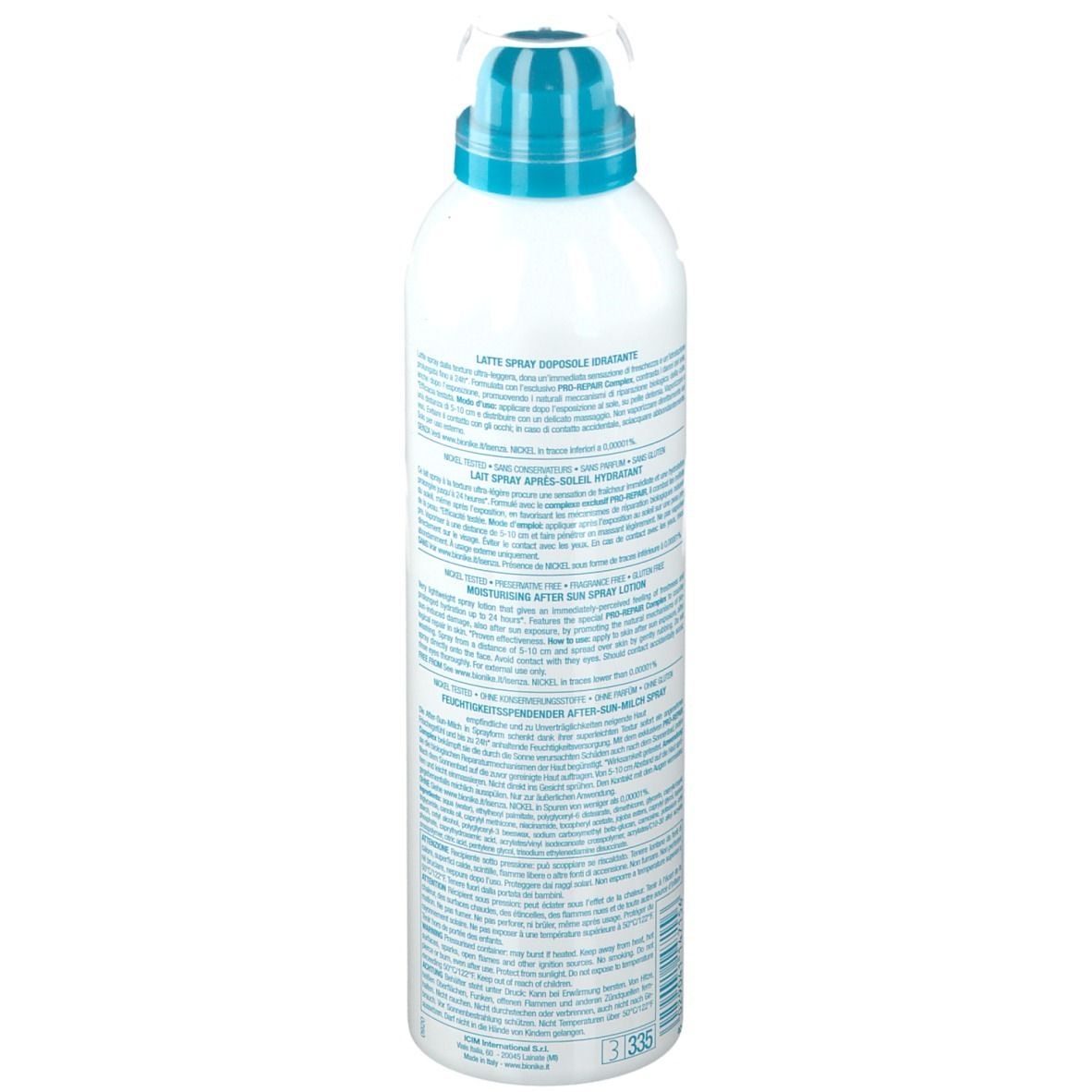 Spray bianco con erogatore blu. Testo sul retro. Scritta: After Sun Defence Sun, Latte Spray.