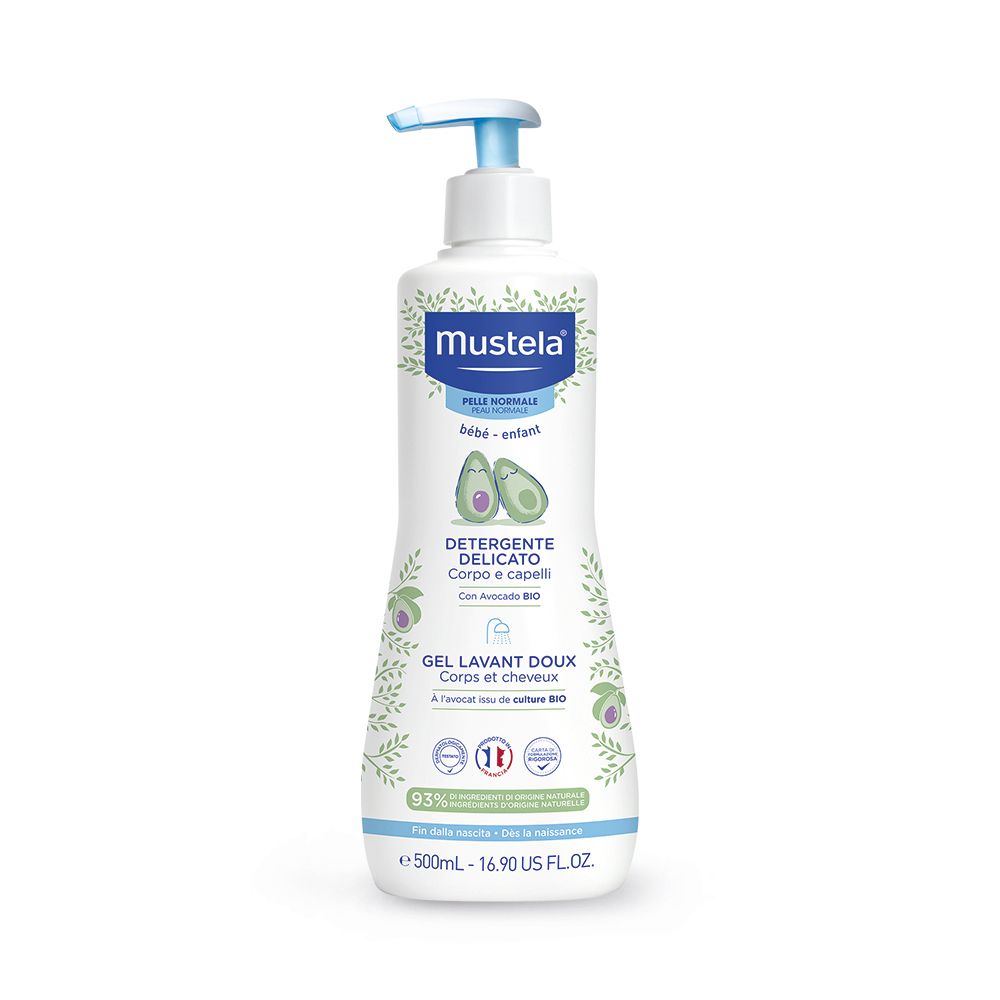 Flacone bianco con dosatore blu. Scritta: Mustela, Detergente Delicato, 500ml. Illustrazione avocado.