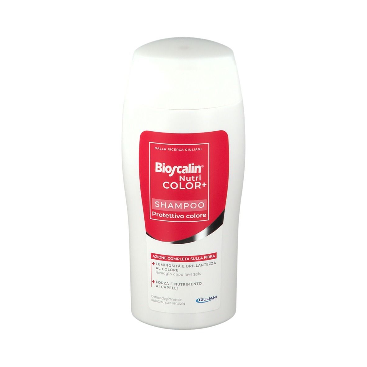 Flacone bianco con etichetta rossa. Nome e logo del prodotto. Testo: Shampoo, protezione colore. Logo Giuliani.