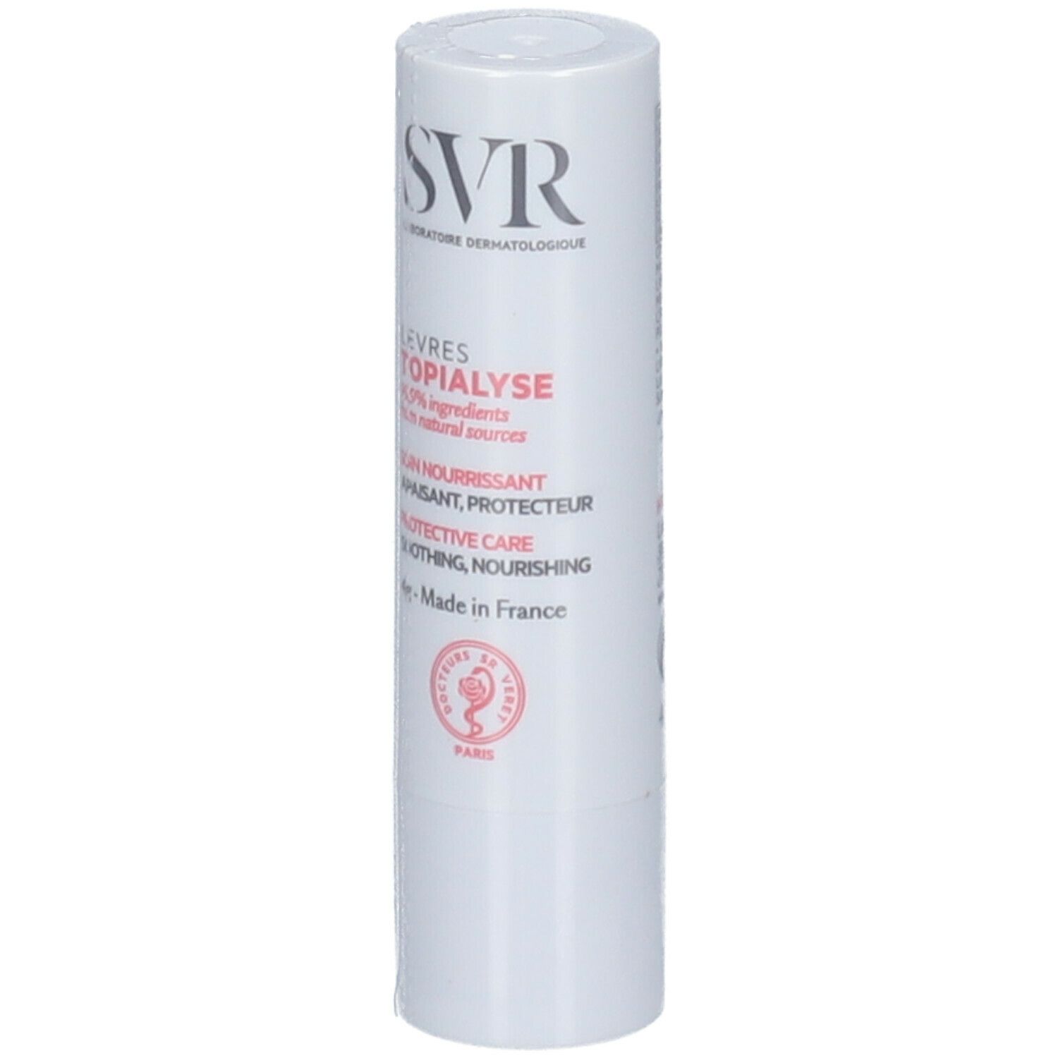 Stick labbra bianco con testo rosso e nero. Marchio SVR. Testo: Levres Topialyse, 99% ingredienti di origine naturale.