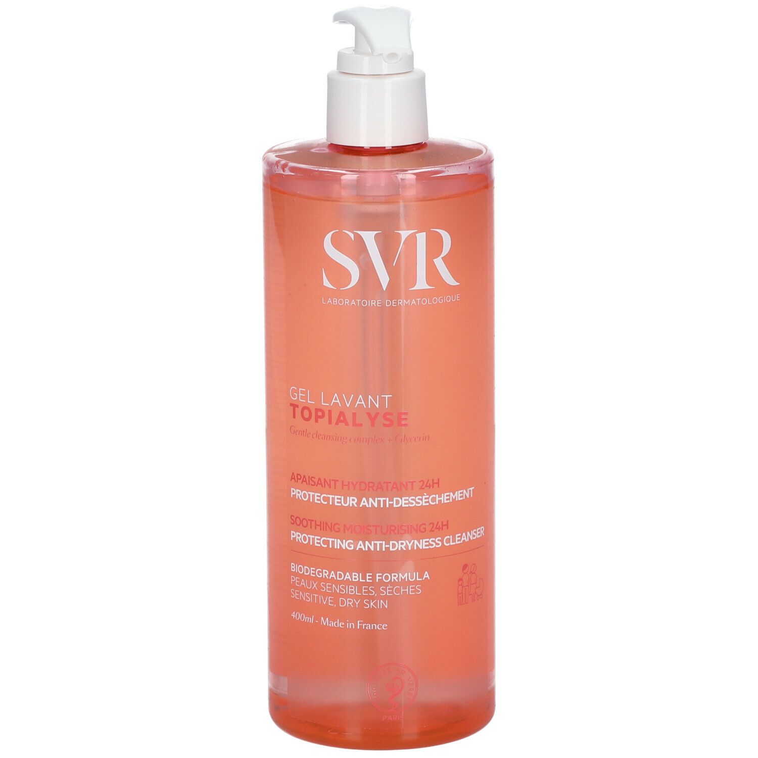 Flacone trasparente rosa con dosatore bianco. Scritta: SVR, Gel Lavant Topialyse. Protezione anti-secchezza.