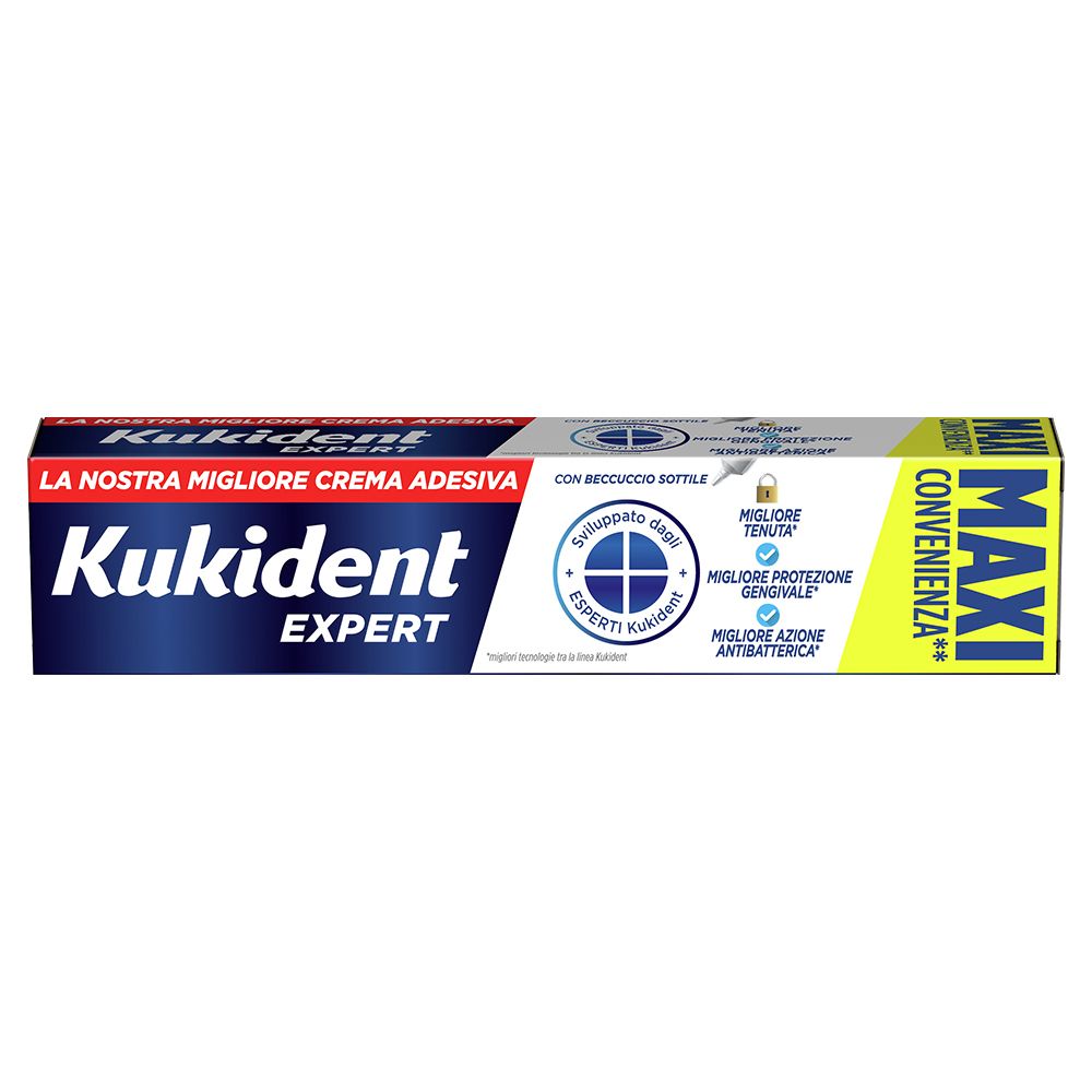 Tubo e confezione Kukident Expert Crema Adesiva. Tubo blu con testo bianco. Confezione gialla e rossa.