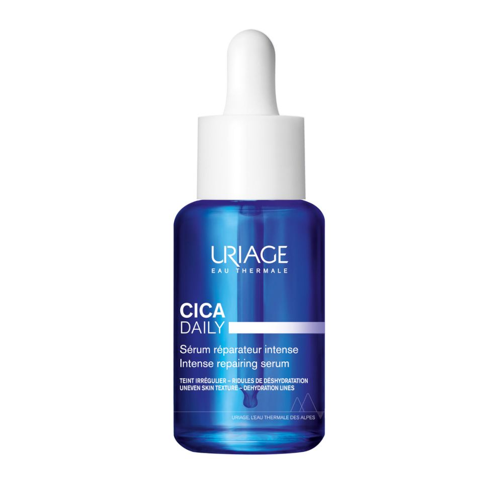 Flacone di siero blu con tappo bianco e contagocce. Scritta: URIAGE, CICA DAILY, Sérum réparateur intense.