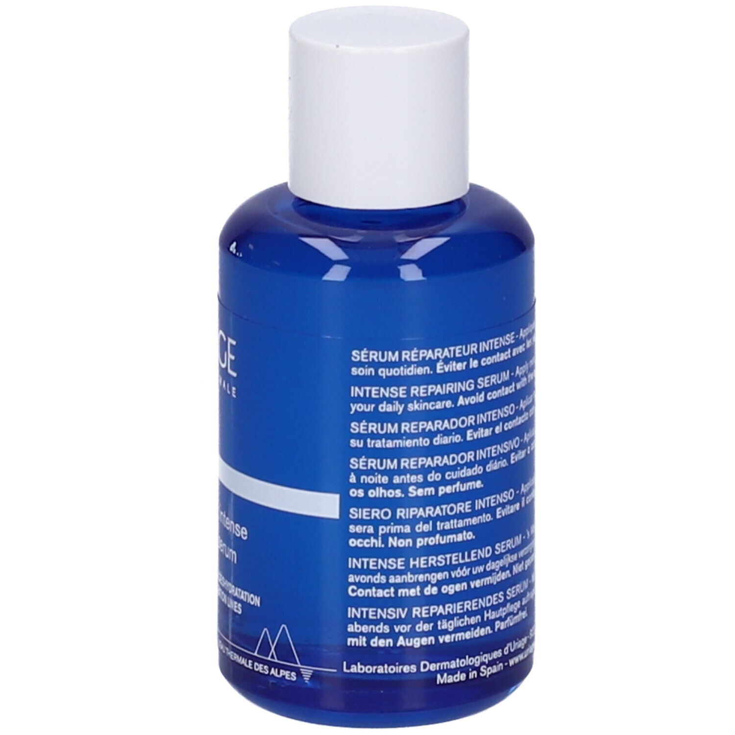 Retro del flacone di siero blu. Testo multilingue. Scritta: URIAGE, 30ml, 1 fl.oz.