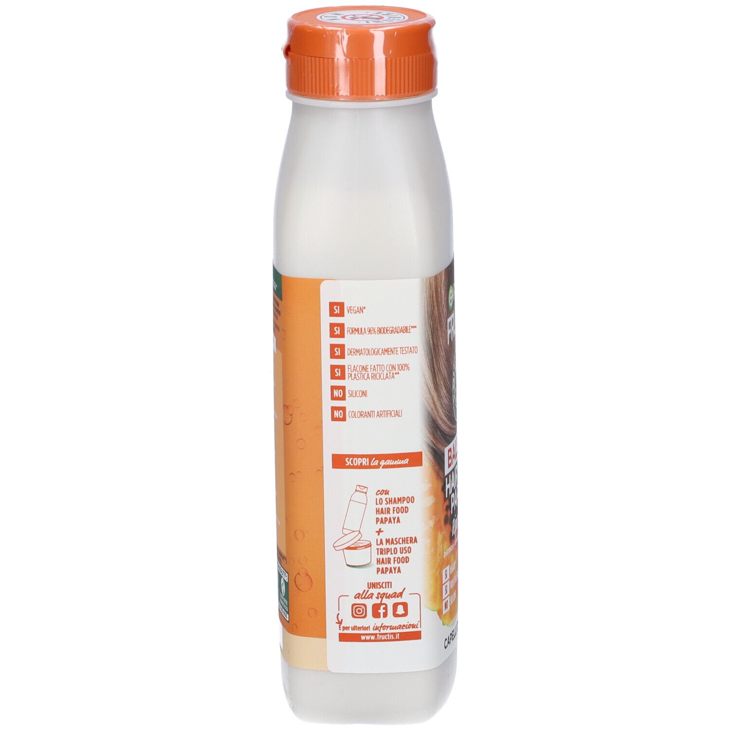 Retro della bottiglia Garnier Fructis Balsamo Hair Food Papaya. Testo e illustrazioni su sfondo arancione. Informazioni sul prodotto.