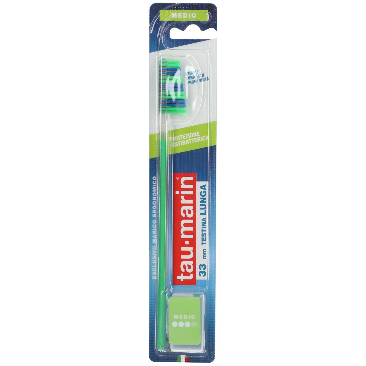 Brosse à dents Tau Marin Skalar 33 Medium, bleue et verte, emballage. Soies vertes, manche bleu, texte.