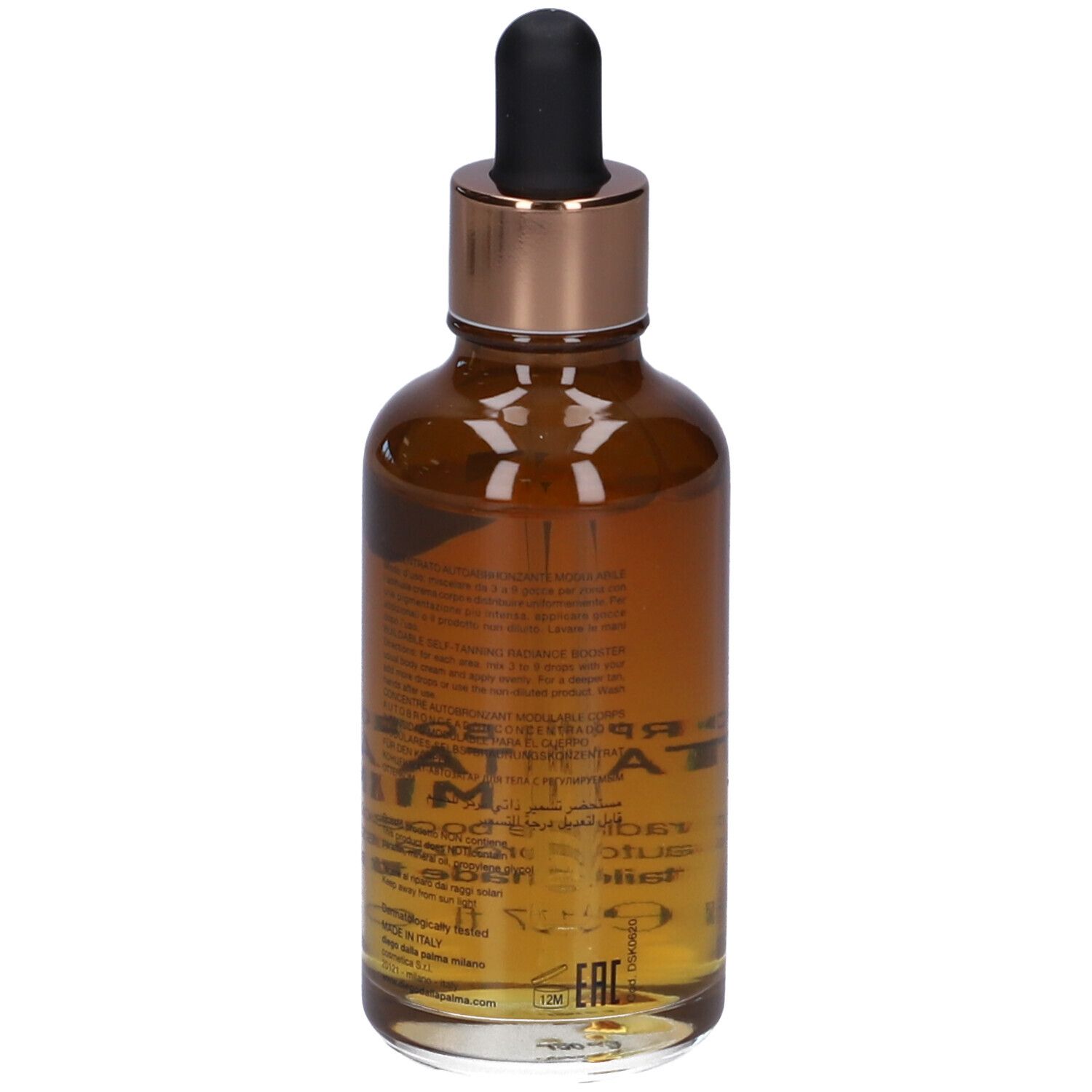 Flacone di vetro marrone con contagocce nero. Retro con testo. Scritta: TAN TAN MIX.