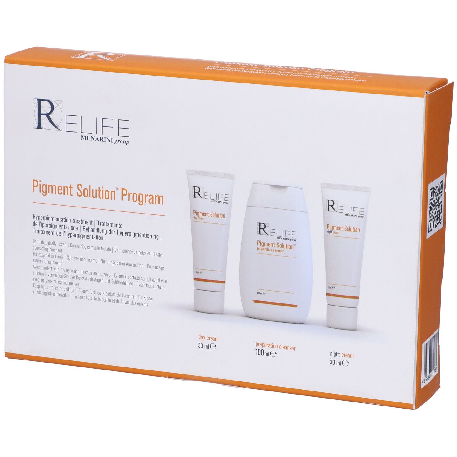 Scatola RELIFE Pigment Solution Program. Tre prodotti: crema giorno, detergente, crema notte. Tubi e flacone bianchi.