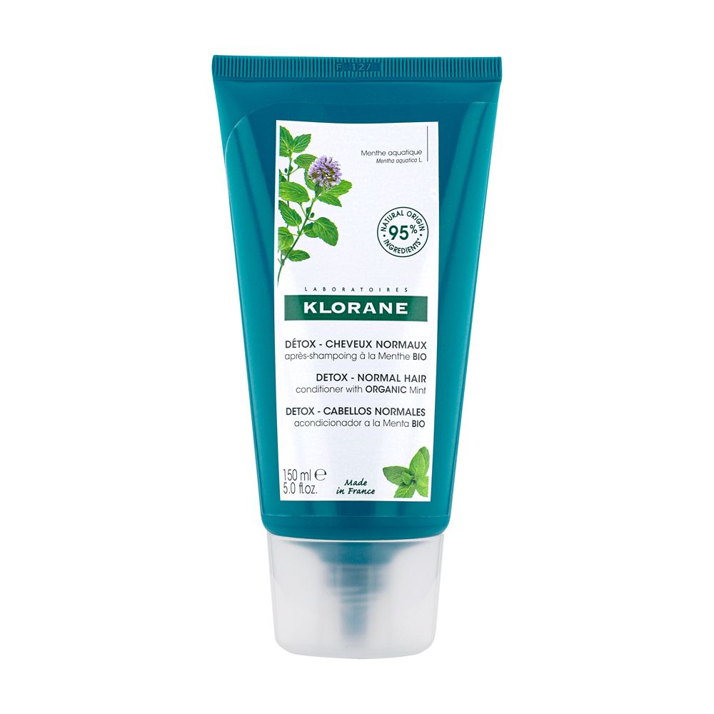 Tubo turchese Klorane. Illustrazione menta e testo. Contiene il 95% di ingredienti di origine naturale.
