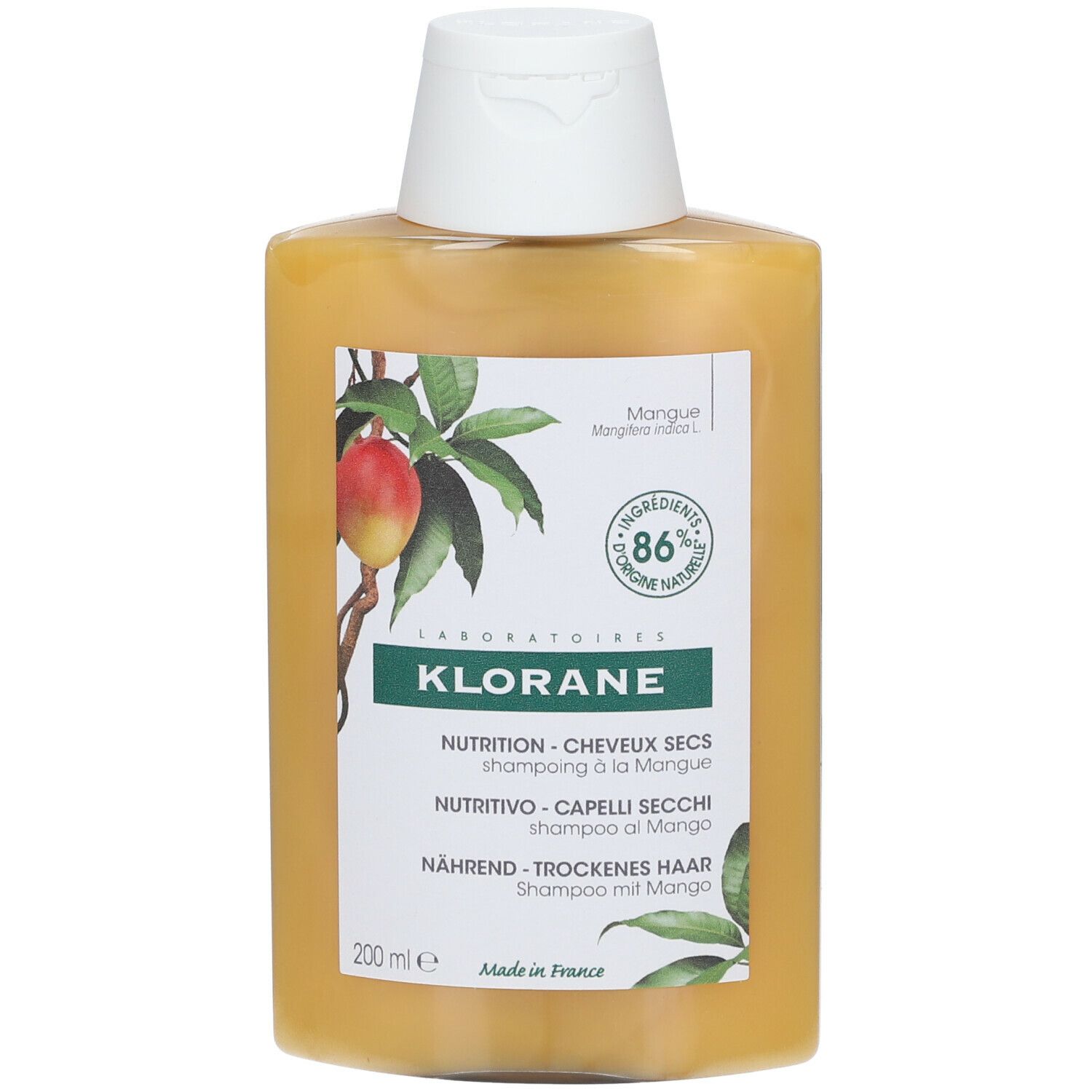 Flacon de shampooing jaune avec illustration de mangue et texte: KLORANE, Shampooing, 86% ingrédients naturels.