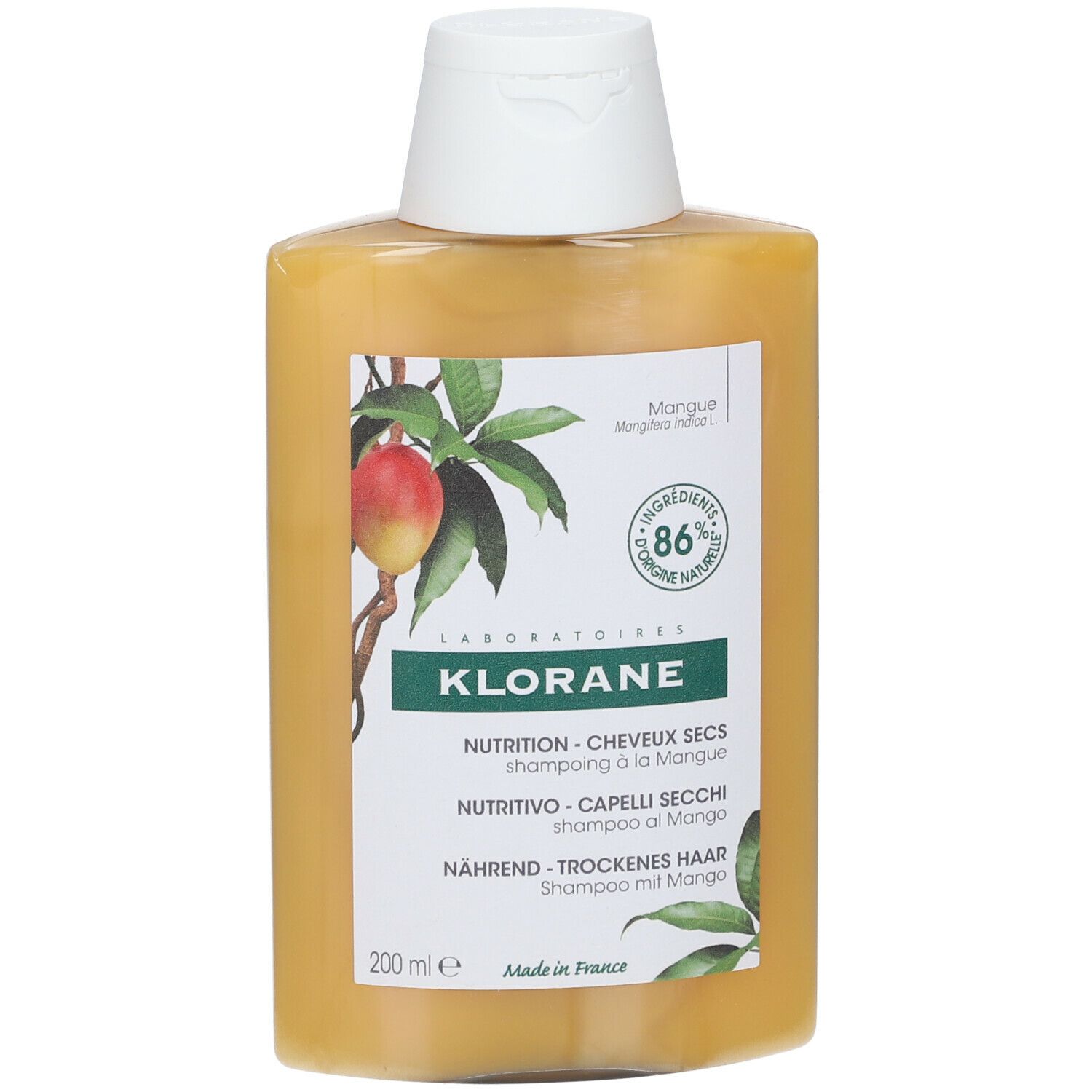 Flacon de shampooing jaune avec illustration de mangue et texte: KLORANE, Shampooing, 86% ingrédients naturels.
