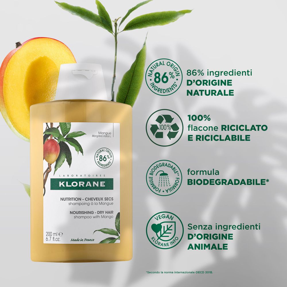 Flacon de shampooing jaune avec illustration de mangue. Texte: 86% ingrédients naturels, flacon 100% recyclable, biodégradable.