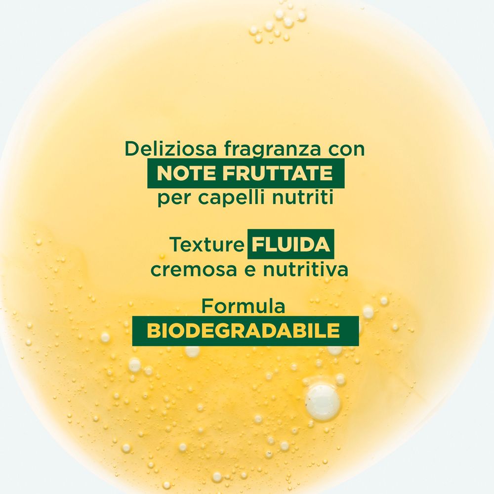 Gros plan d'un liquide jaune. Texte: Notes fruitées, texture crémeuse, biodégradable.