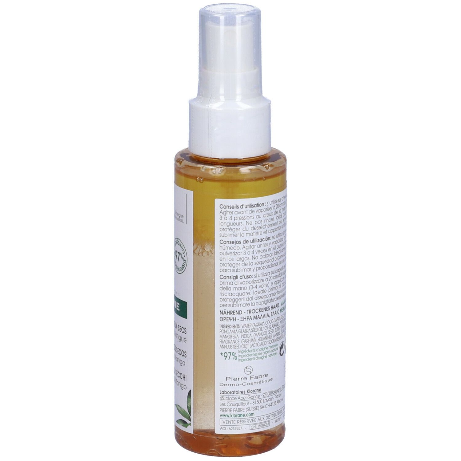 Retro del flacone di olio per capelli KLORANE. Testo multilingue. Ingredienti, consigli d'uso. 97% ingredienti naturali.