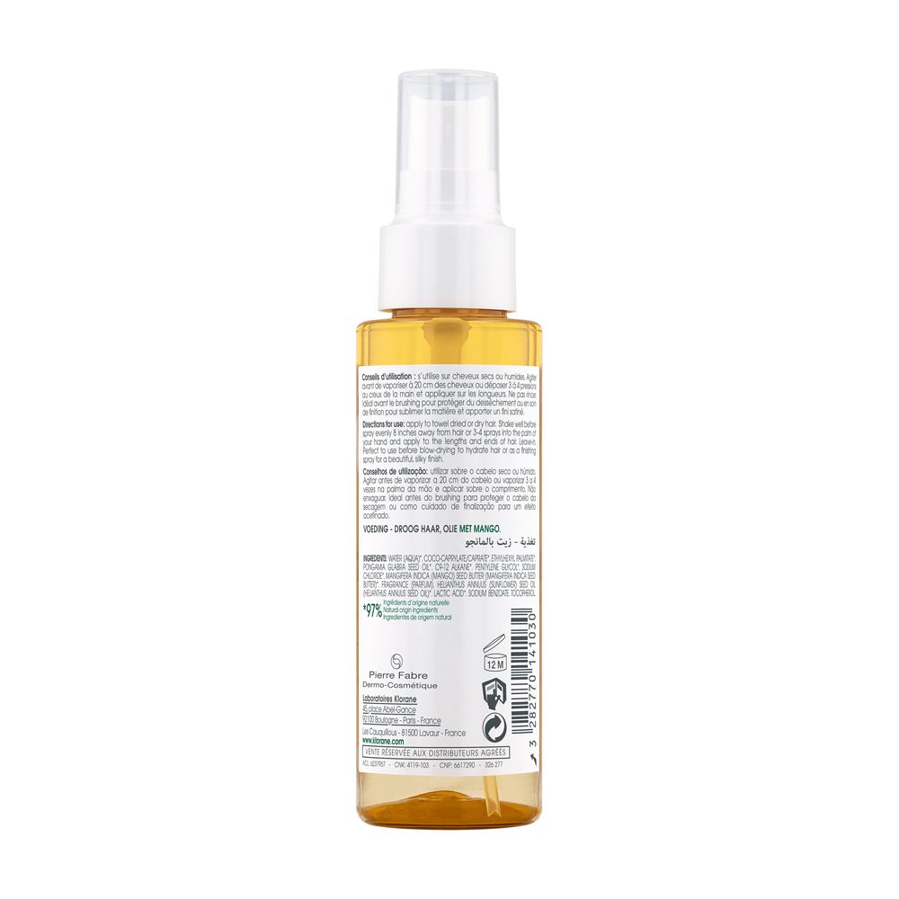Retro del flacone di olio per capelli KLORANE. Testo multilingue. Ingredienti, consigli d'uso. 97% ingredienti naturali.