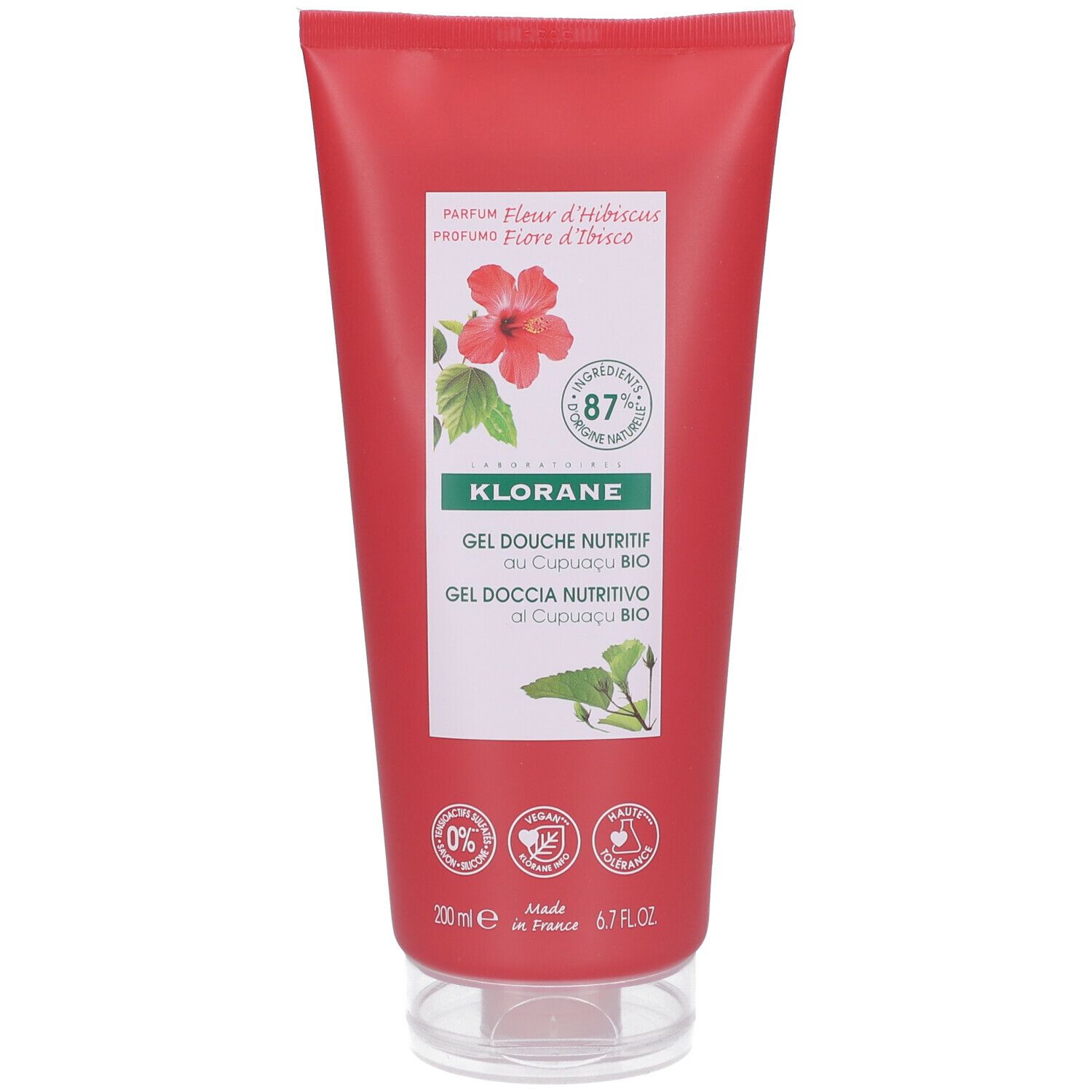 Tubo rosso con etichetta bianca. Scritta: KLORANE, Gel Douche Nutritif, Cupuaçu BIO. Illustrazione di fiori di ibisco.