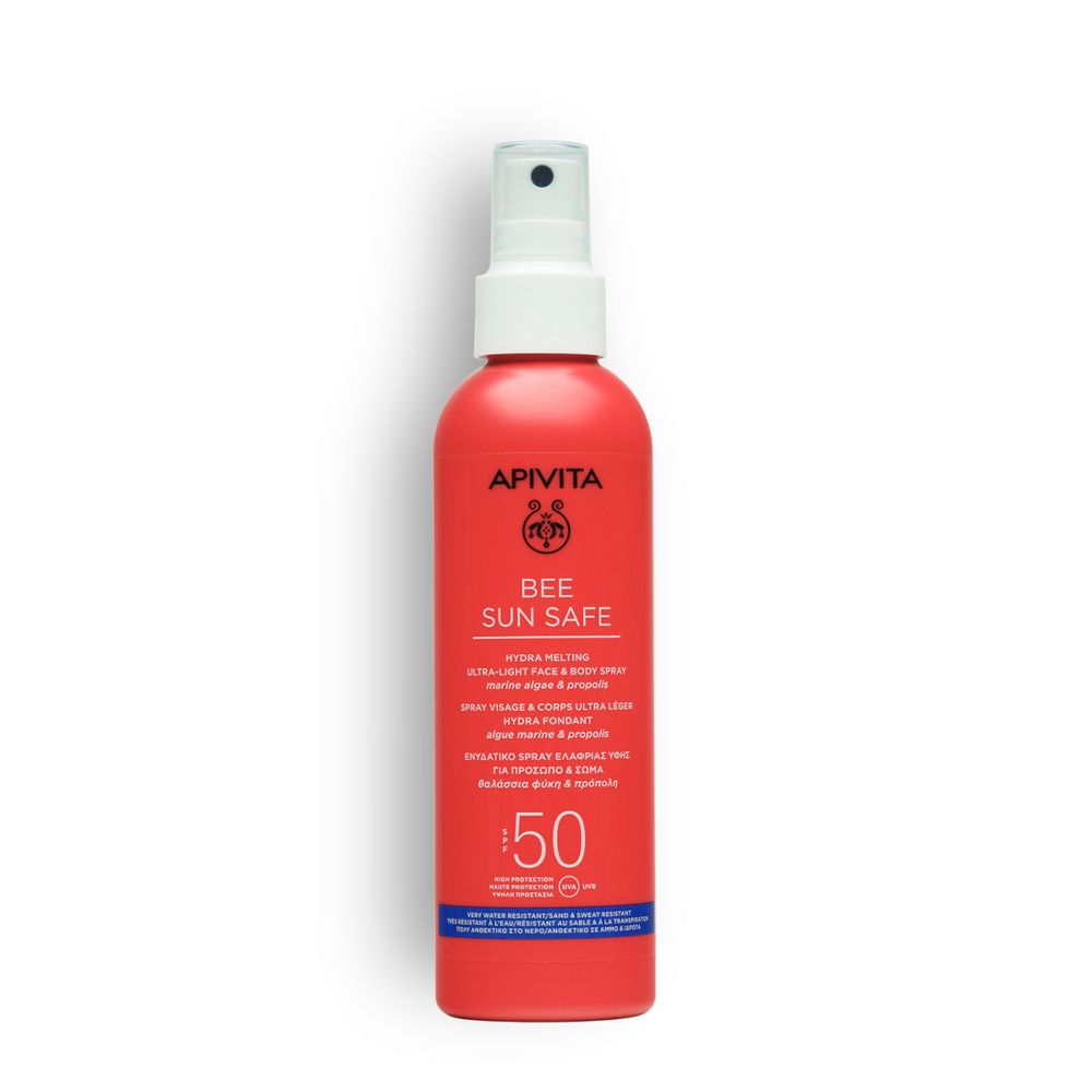 Flacone spray rosso con erogatore bianco. Scritta: APIVITA BEE SUN SAFE, SPF 50.