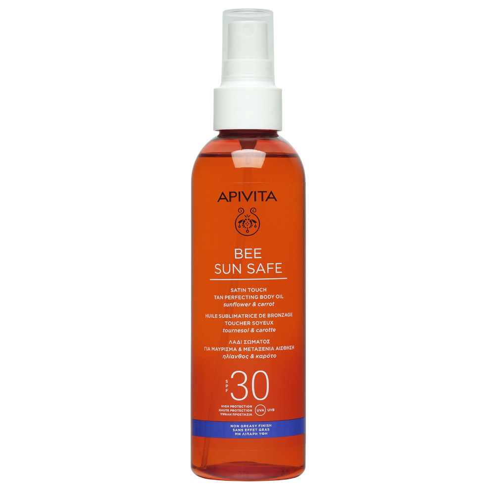 Olio APIVITA Bee Sun Safe. Liquido marrone in flacone spray. SPF 30. Erogatore bianco.