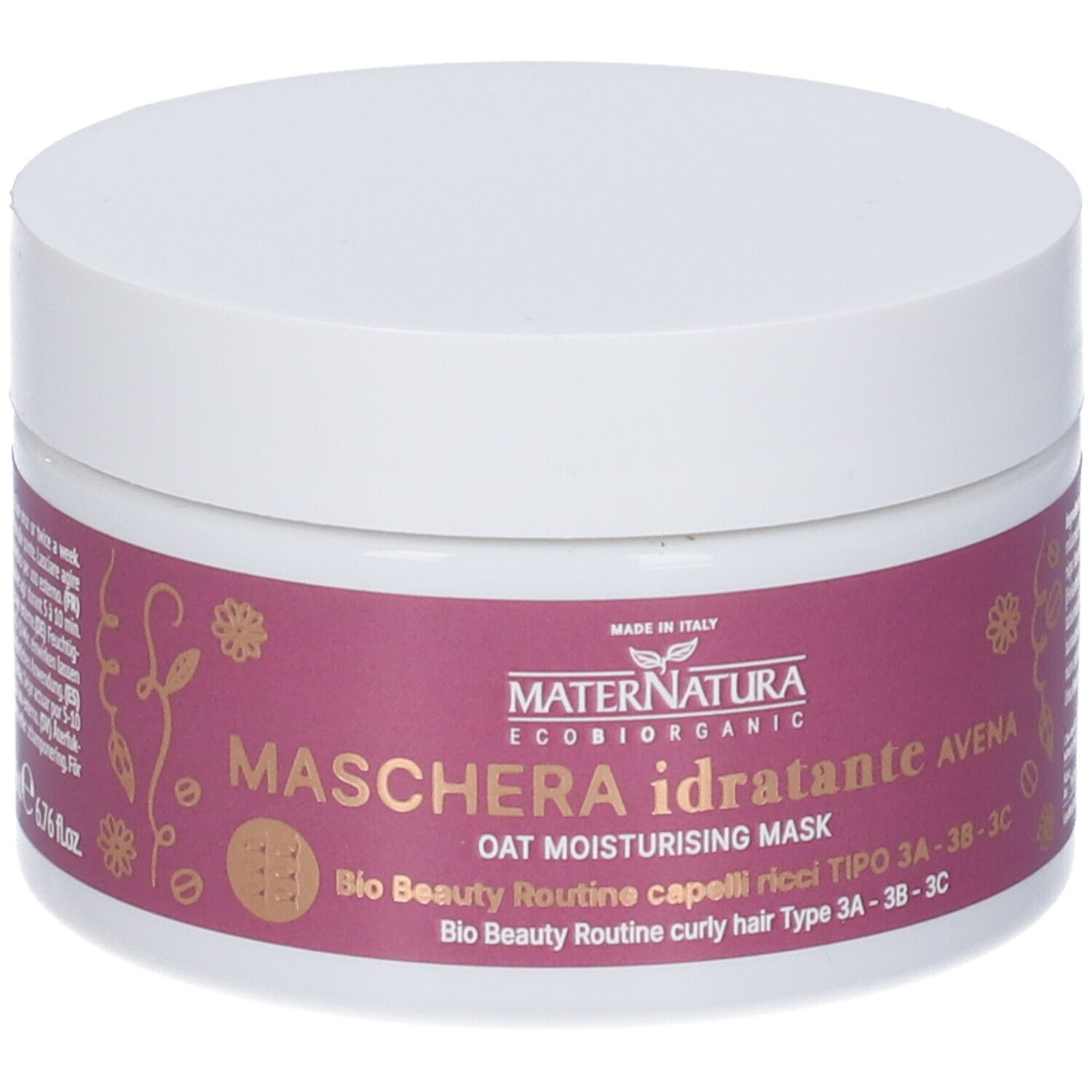 Vaso bianco con etichetta viola. Scritta: Maschera Idratante Avena. Marchio: Maternatura.