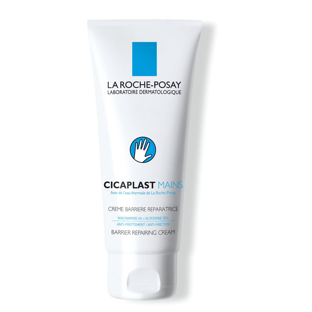 Tubo bianco con marchio blu. Scritta: La Roche-Posay, Cicaplast Mains, Crema Barriera Riparatrice. Logo: mano.