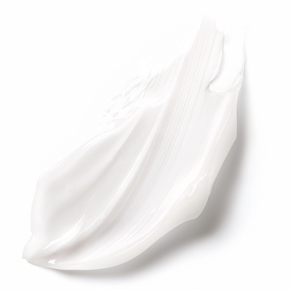 Macchia di crema bianca. Texture visibile. Nessuna denominazione del prodotto.