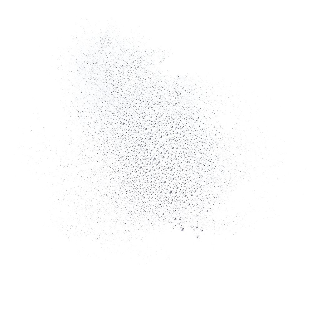Primo piano di goccioline d'acqua spruzzate su una superficie bianca.