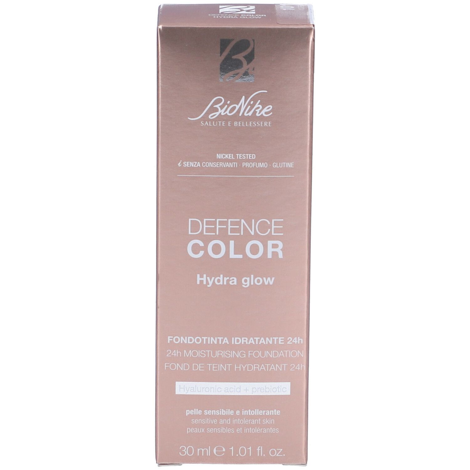Scatola rosa. Scritta: Defence Color Hydra glow, Fondotinta Idratante 24h, 30 ml.