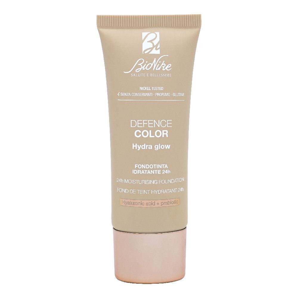 Tubo beige. Marchio BioNike, Defence Color Hydra Glow. Fondotinta Idratante 24H. Ingredienti visibili.