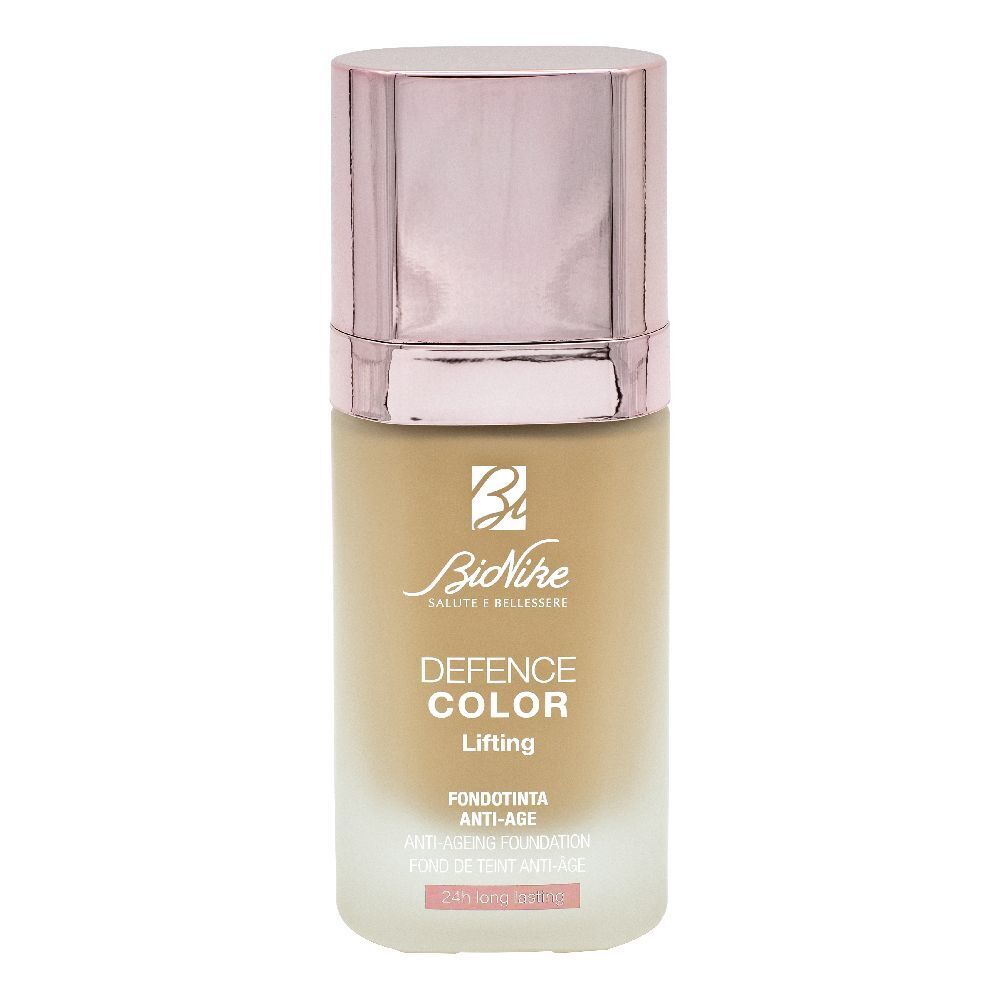 Fondotinta liquido in flacone con tappo oro rosa. Scritta: Defence Color Lifting.