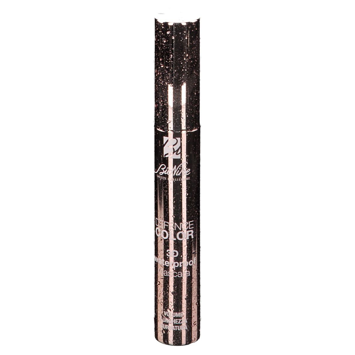 Mascara-Flakon. Rosa-goldener Flakon mit vertikalen Streifen. Text: DEFENCE COLOR 3D waterproof mascara.