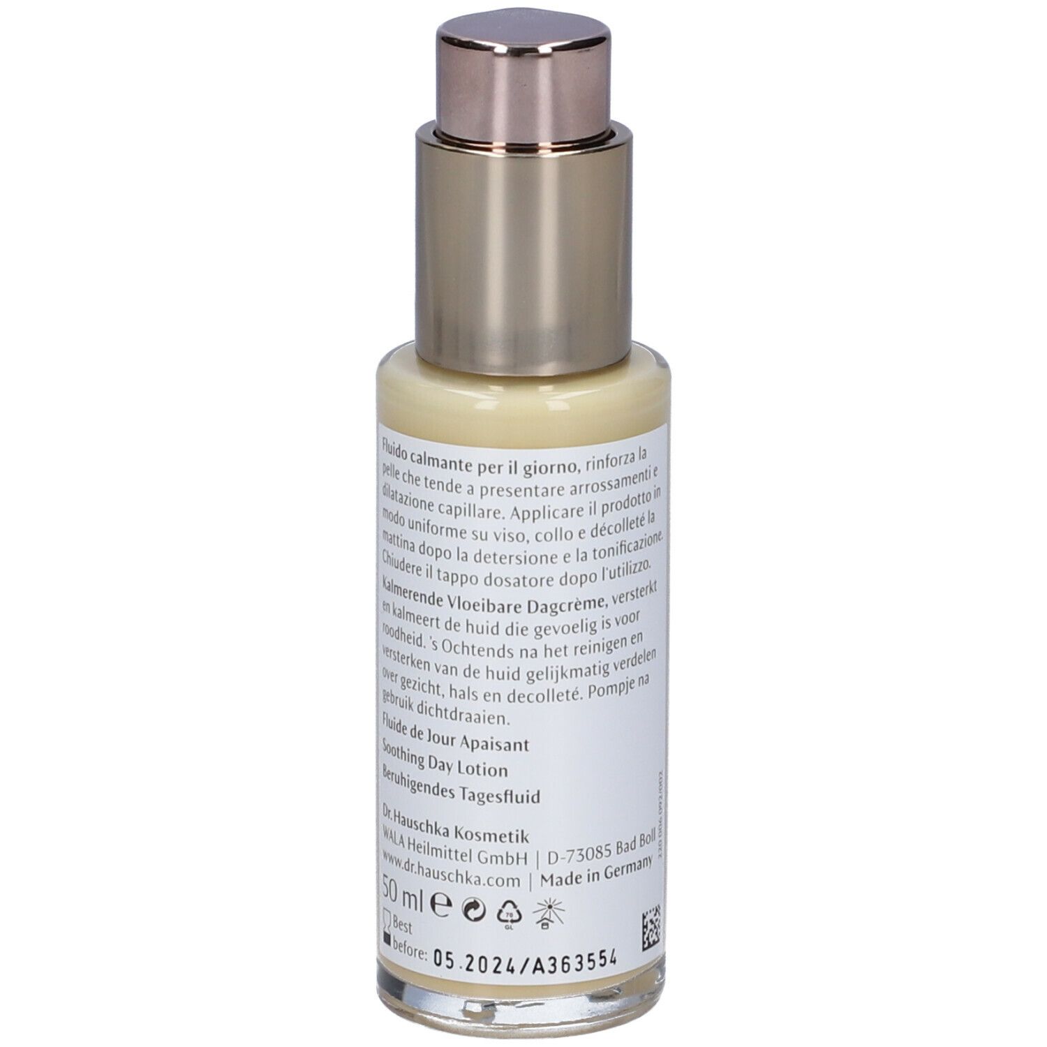 Rückseite des Creme-Flakons. Text in mehreren Sprachen. Aufschrift: Dr. Hauschka, Fludio calmante per il giorno, Kalmerende Vloeibare Dagcrème.