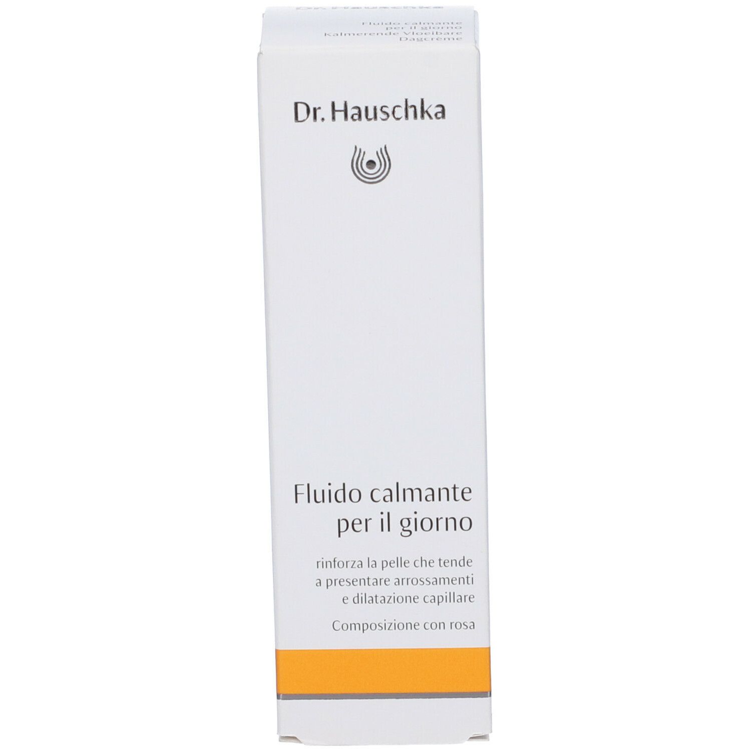 Weiße Verpackung mit Aufschrift: Dr. Hauschka, Fludio calmante per il giorno. Orangefarbener Streifen am unteren Rand.