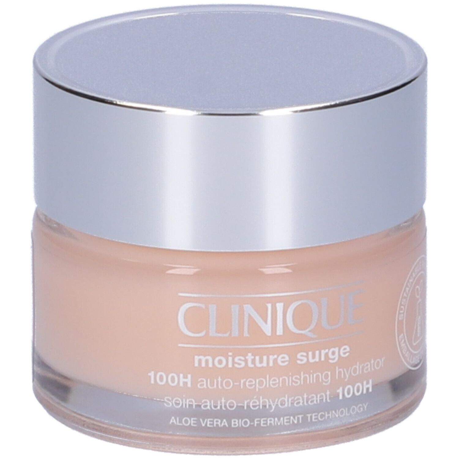 Vaso di crema con coperchio argentato. Scritta: Clinique, moisture surge, 100H auto-replenishing hydrator. Imballaggio sostenibile.