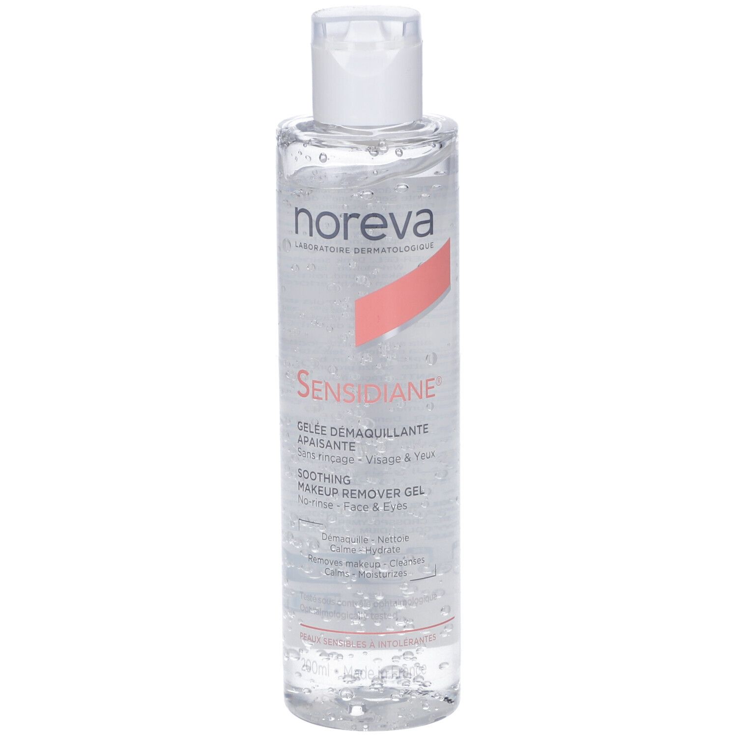Flacone trasparente con tappo bianco. Scritta Noreva Sensidiane, Gelée Démaquillante Apaisante. Per viso e occhi.