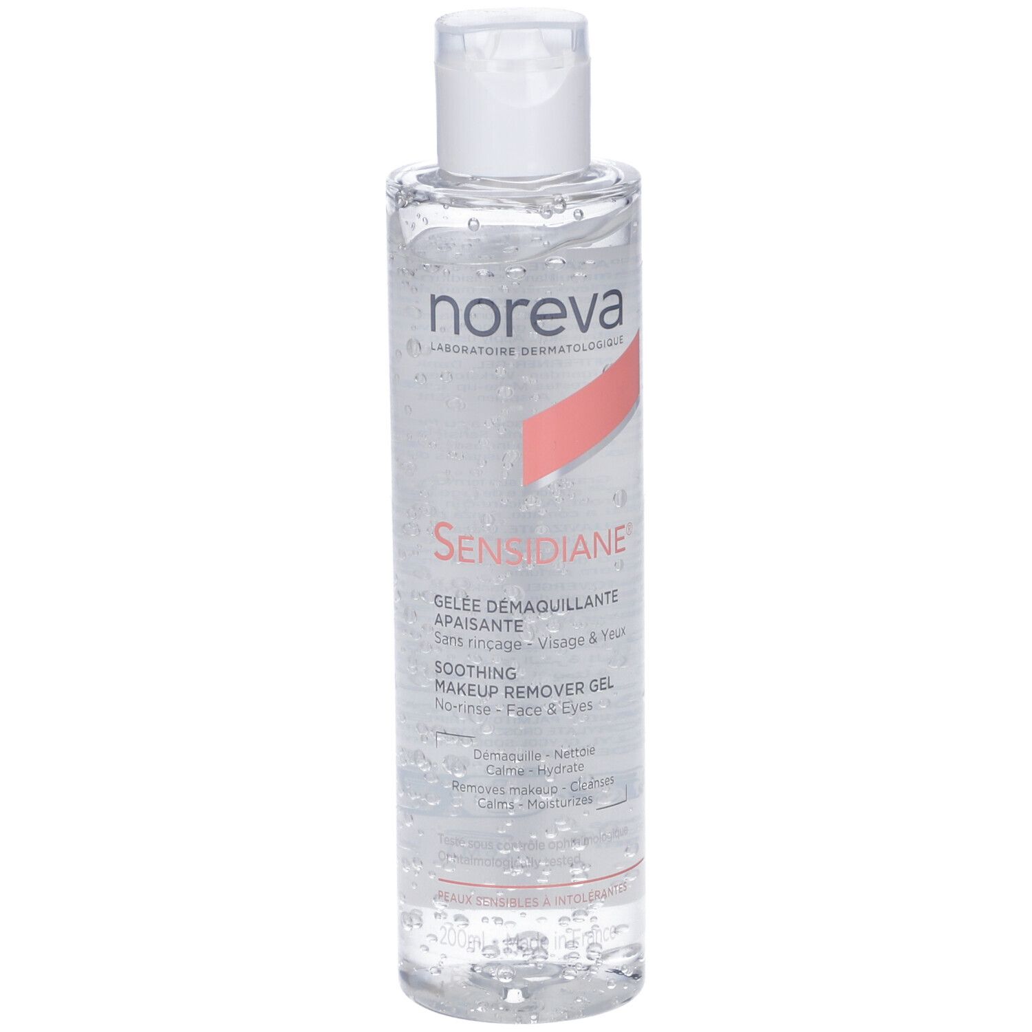 Flacone trasparente con tappo bianco. Scritta Noreva Sensidiane, Gelée Démaquillante Apaisante. Per viso e occhi.