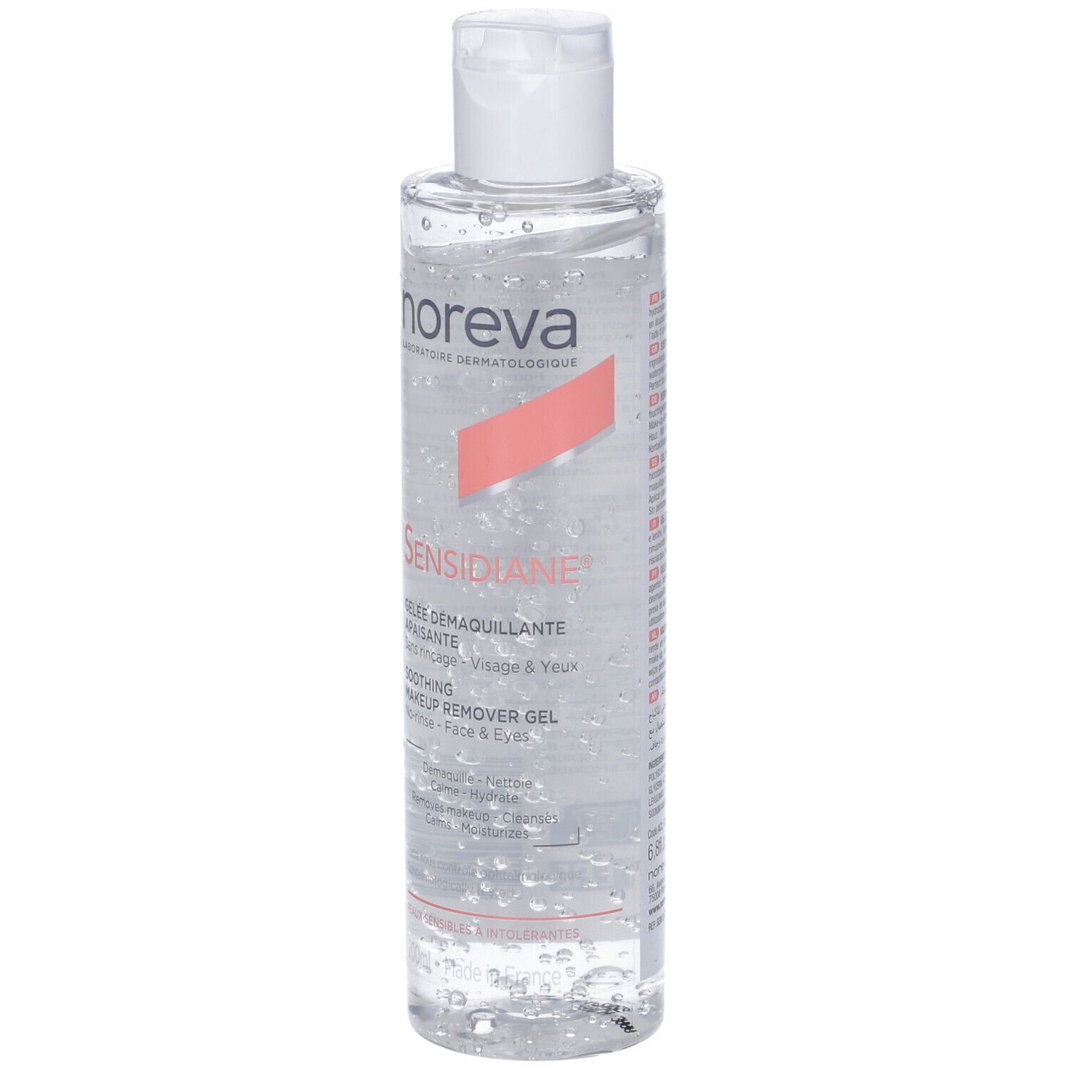 Flacone trasparente con tappo bianco. Scritta Noreva Sensidiane, Gelée Démaquillante Apaisante. Per viso e occhi.