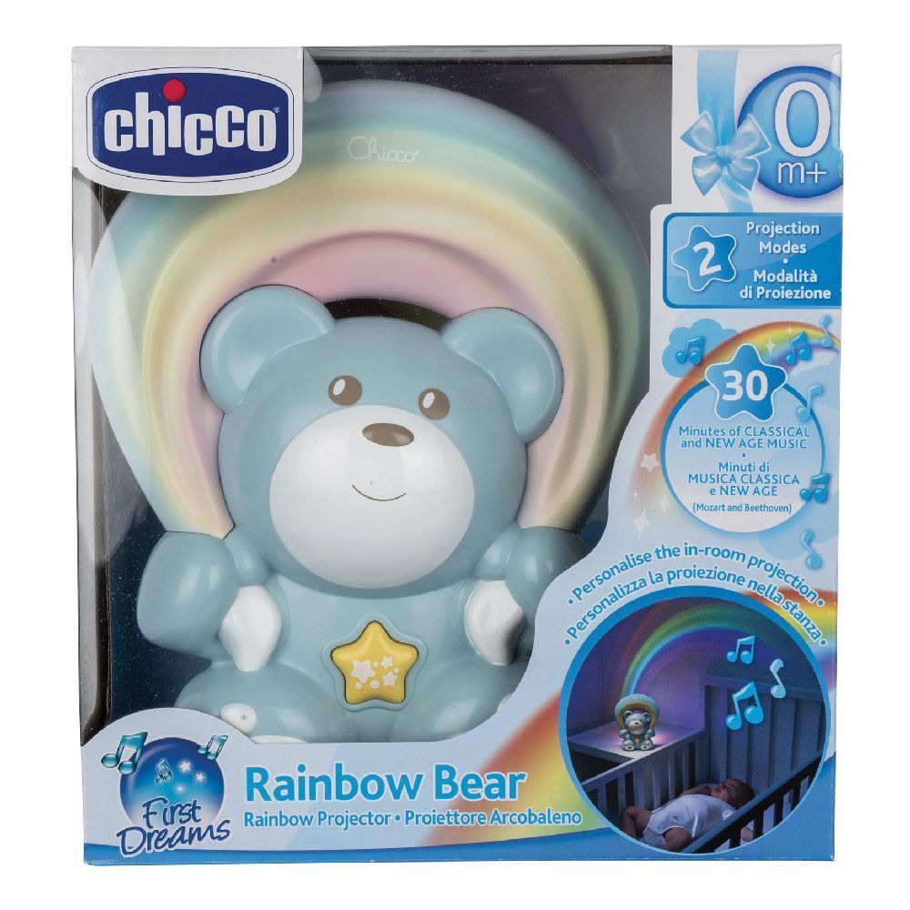 Orsetto blu con proiettore arcobaleno in confezione. Marchio Chicco, modello Rainbow Bear. Include 2 modalità di proiezione e 30 musiche.
