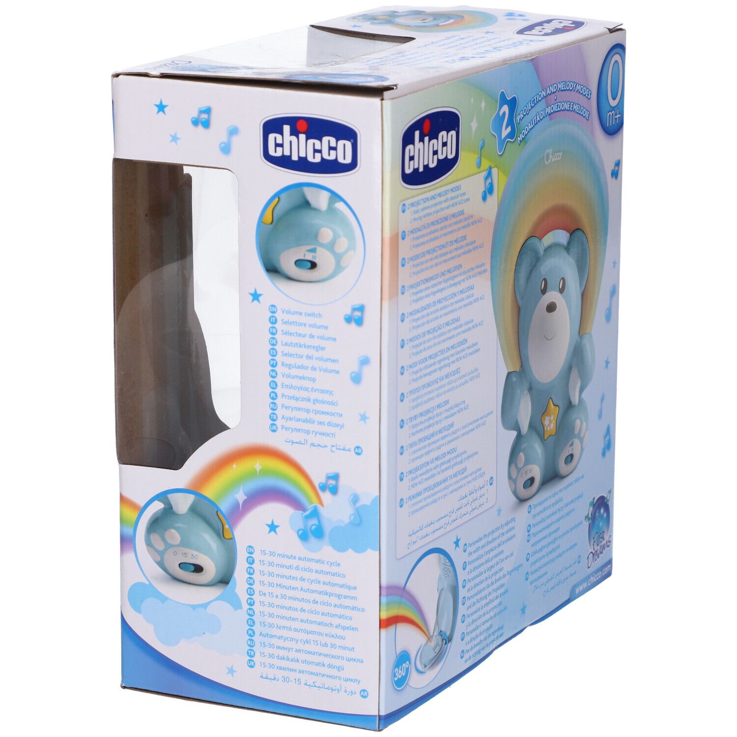 Vista laterale della confezione. Orsetto blu con proiettore arcobaleno. Marchio Chicco, modello Rainbow Bear. 2 modalità e 30 musiche.