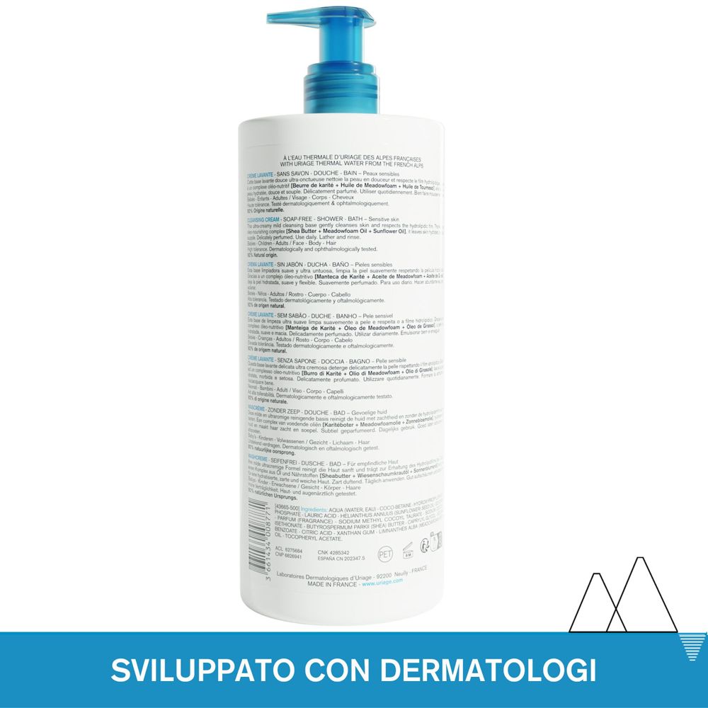 Retro del flacone bianco con dosatore blu. Testo multilingue. Grafica di montagne in basso.
